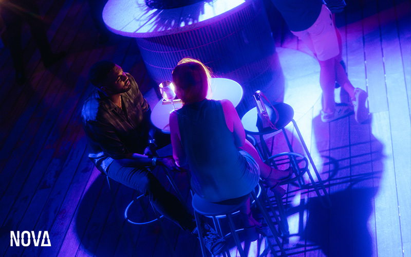 Couple on a first date at Nova Bar.